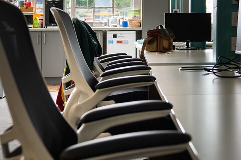 a row of chairs in a room