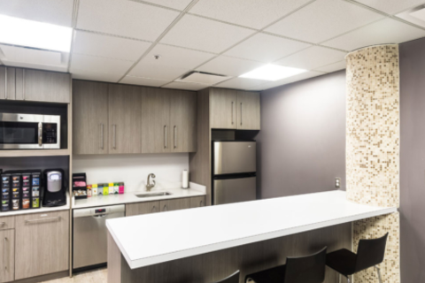 a modern kitchen with stainless steel appliances