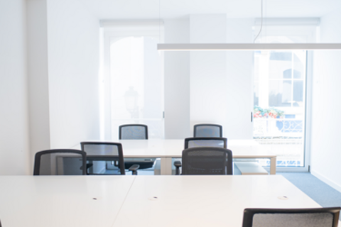 a white table and chairs in a room