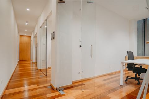 a room filled with furniture and a wood floor