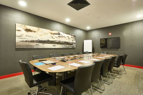a room with a table and chairs
