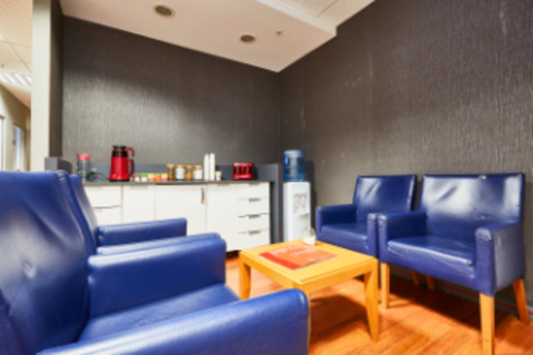 a living room with blue walls