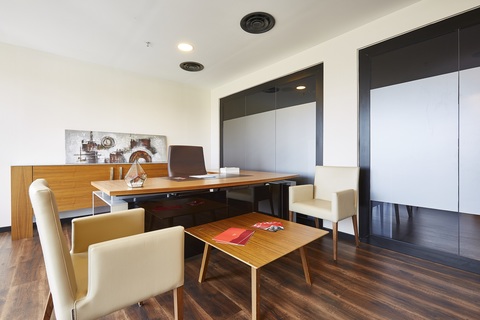 a room filled with furniture and a table