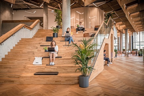 a living area with a building in the background