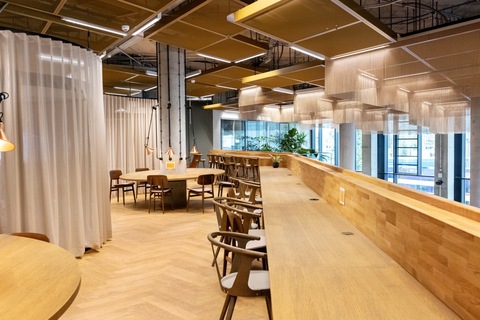a room filled with furniture on top of a wooden table
