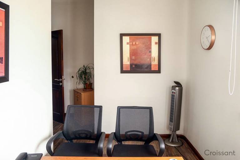 a room filled with furniture and a tv