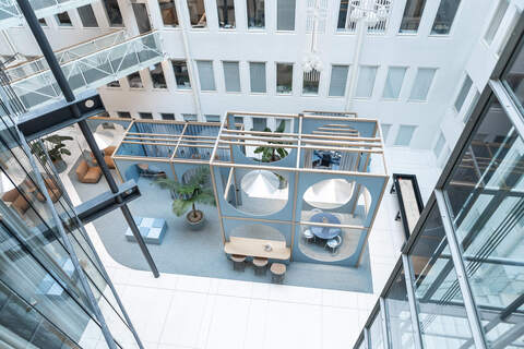 a room with a group of people sitting in it