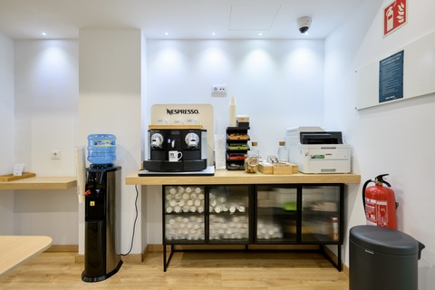 a kitchen with a table in a room