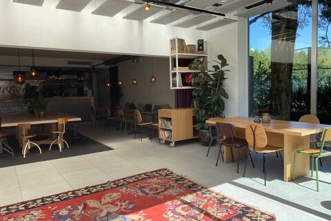 a room filled with furniture and a rug