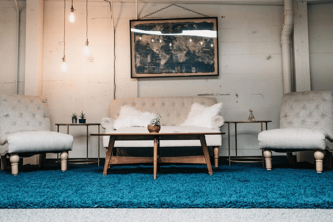 a room with a couch and coffee table