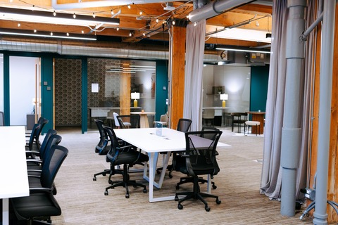 a room with a table and chairs