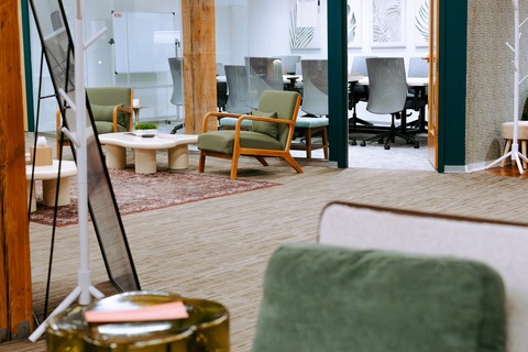 a room with chairs and tables