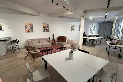 a room filled with furniture and a table