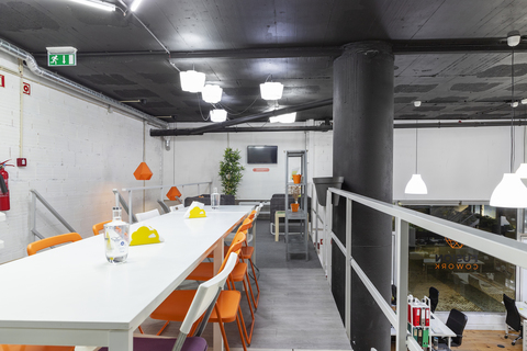 a kitchen with a table in a room