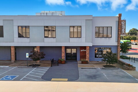 a building with a parking lot
