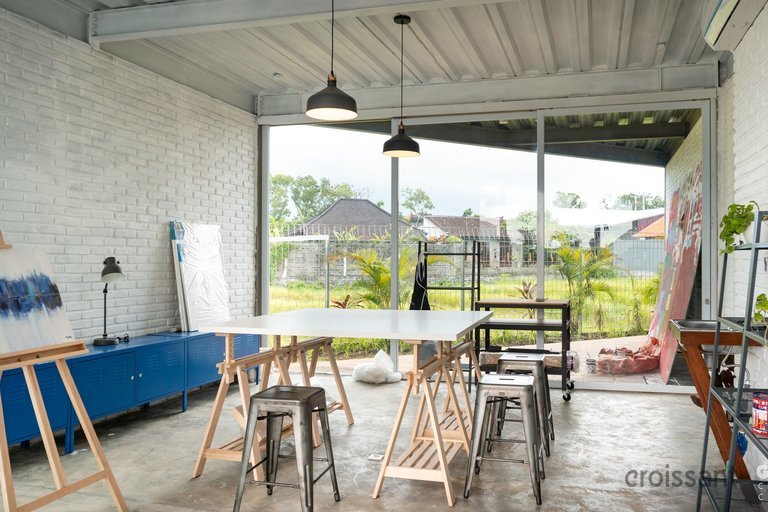 a dining room table in front of a building
