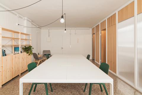 a kitchen with a table in a room