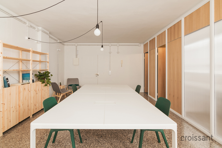 a kitchen with a table in a room