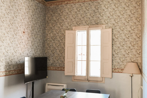 a room with a table and chairs
