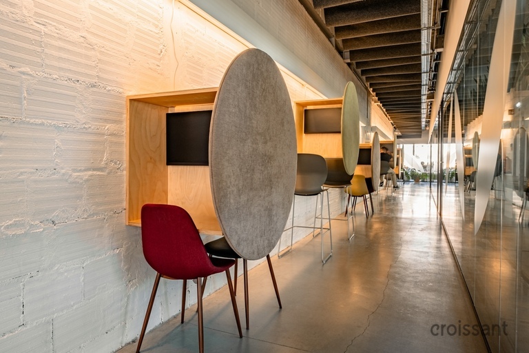 a chair sitting in front of a building