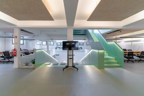 a plane sitting on top of a green room