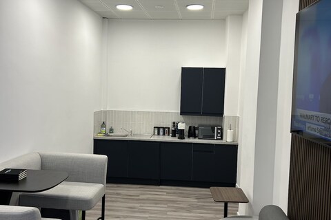 a room filled with furniture and a table