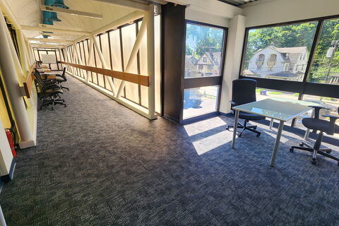 a room with a table and chairs