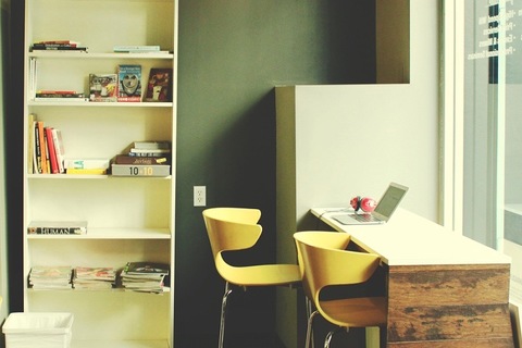 High tables facing outside Indie Desk