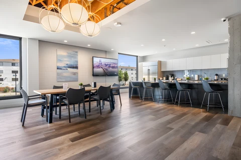 a room filled with furniture and a table