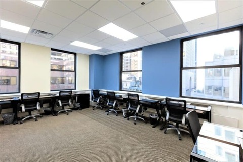 a room filled with furniture and a large window