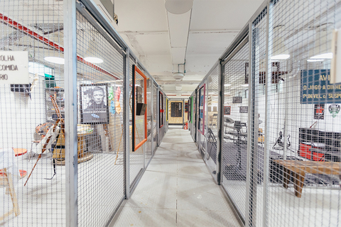 a building with a metal fence