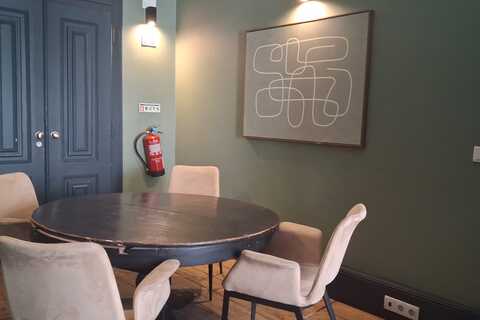 a table and chairs in a room