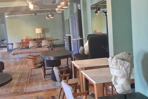 a room with tables and chairs