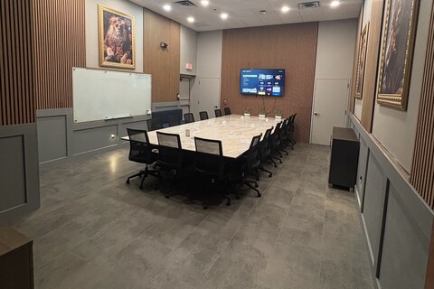 a room with a table and chairs