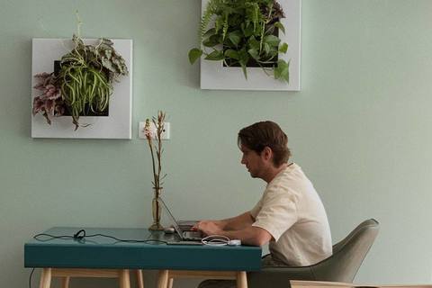 a man and a woman sitting at a desk