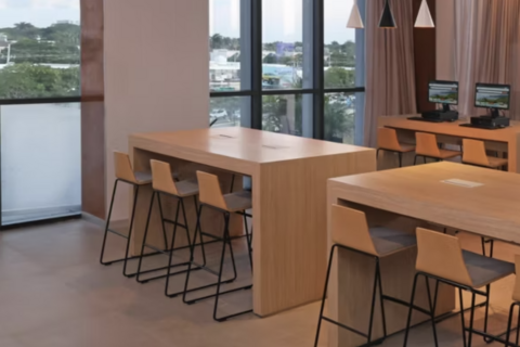 a room with a table and chairs