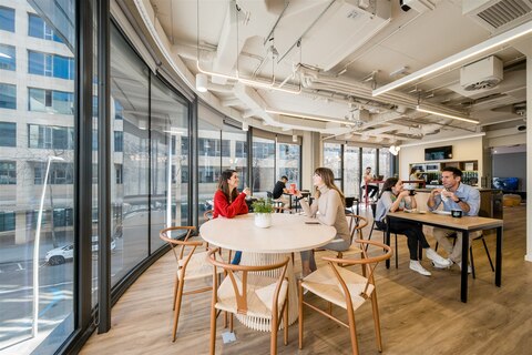 a dining room table in front of a building