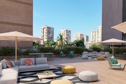 a living area with a building in the background