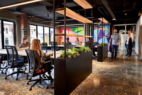 a group of people in an office