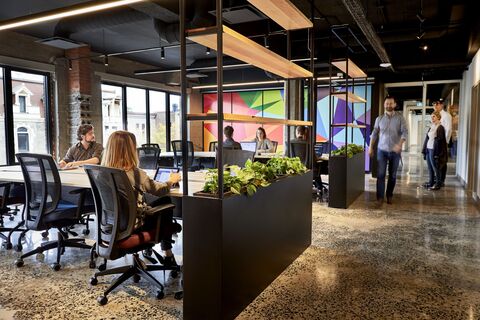 a group of people in an office