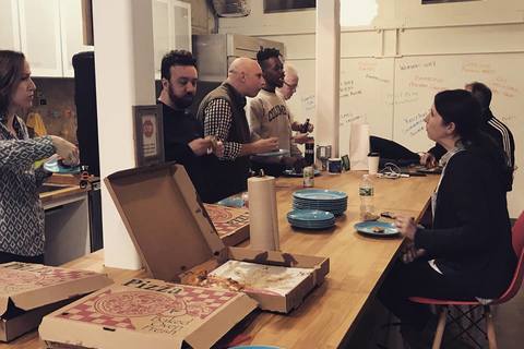 a group of people sitting at a table