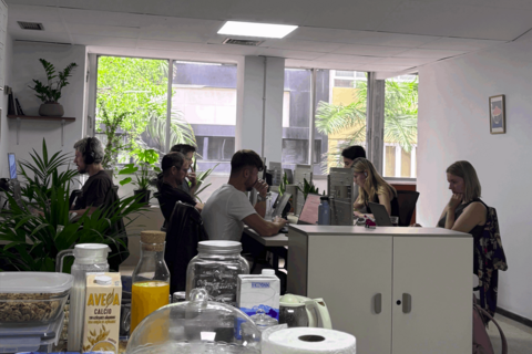 a group of people sitting around a table