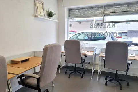 a room with chairs and a table