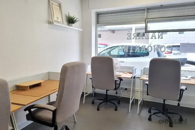 a room with chairs and a table