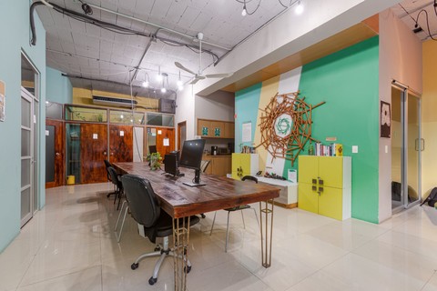 a room filled with furniture and a table