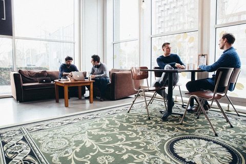 a group of people sitting in a chair
