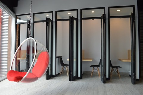 a large red chair in a room