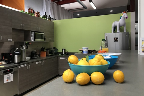 a bowl of fruit on a counter