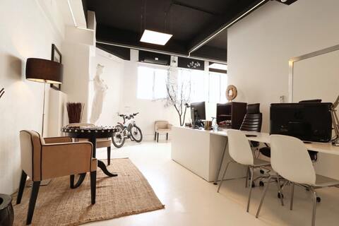 a room filled with furniture and a table