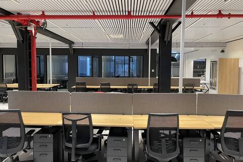 a room with tables and chairs